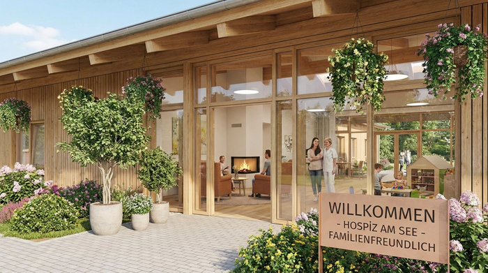 Einladender Eingangsbereich eines modernen, familiären Hospizes mit Pflanzen