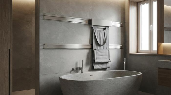 Dezenter Tuchlift an der Wand über einer modernen Badewanne