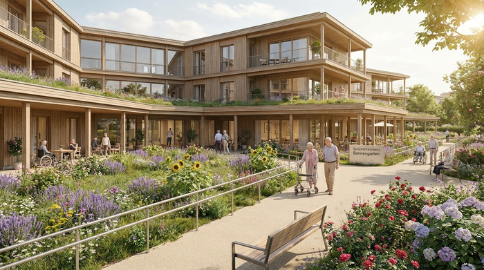 Ein modernes, ansprechendes Gebäude eines Seniorenheims mit einer gepflegten Gartenanlage. Bunte Blumen blühen in den Beeten, und breite, barrierefreie Wege laden zum Spazieren in der Sonne ein.